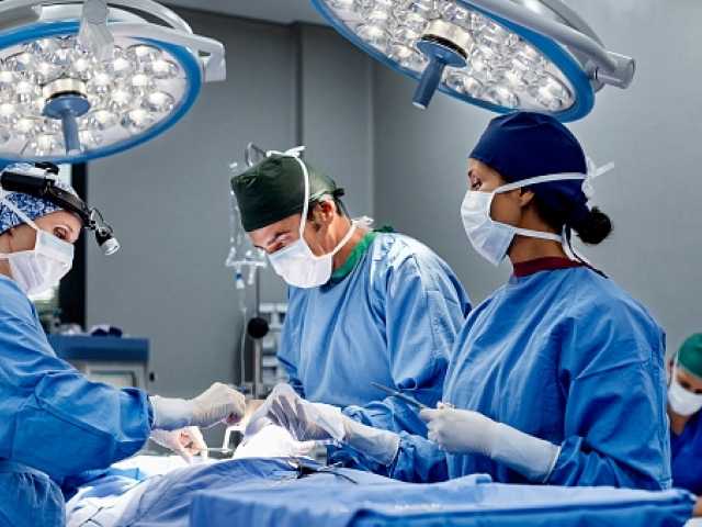 Doctors working on heart transplant